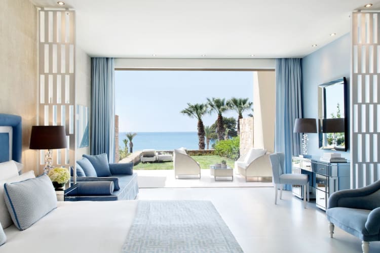Junior Suite bed and sitting and outdoor